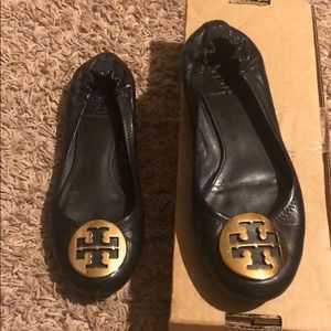 Black and gold Tory Burch flats